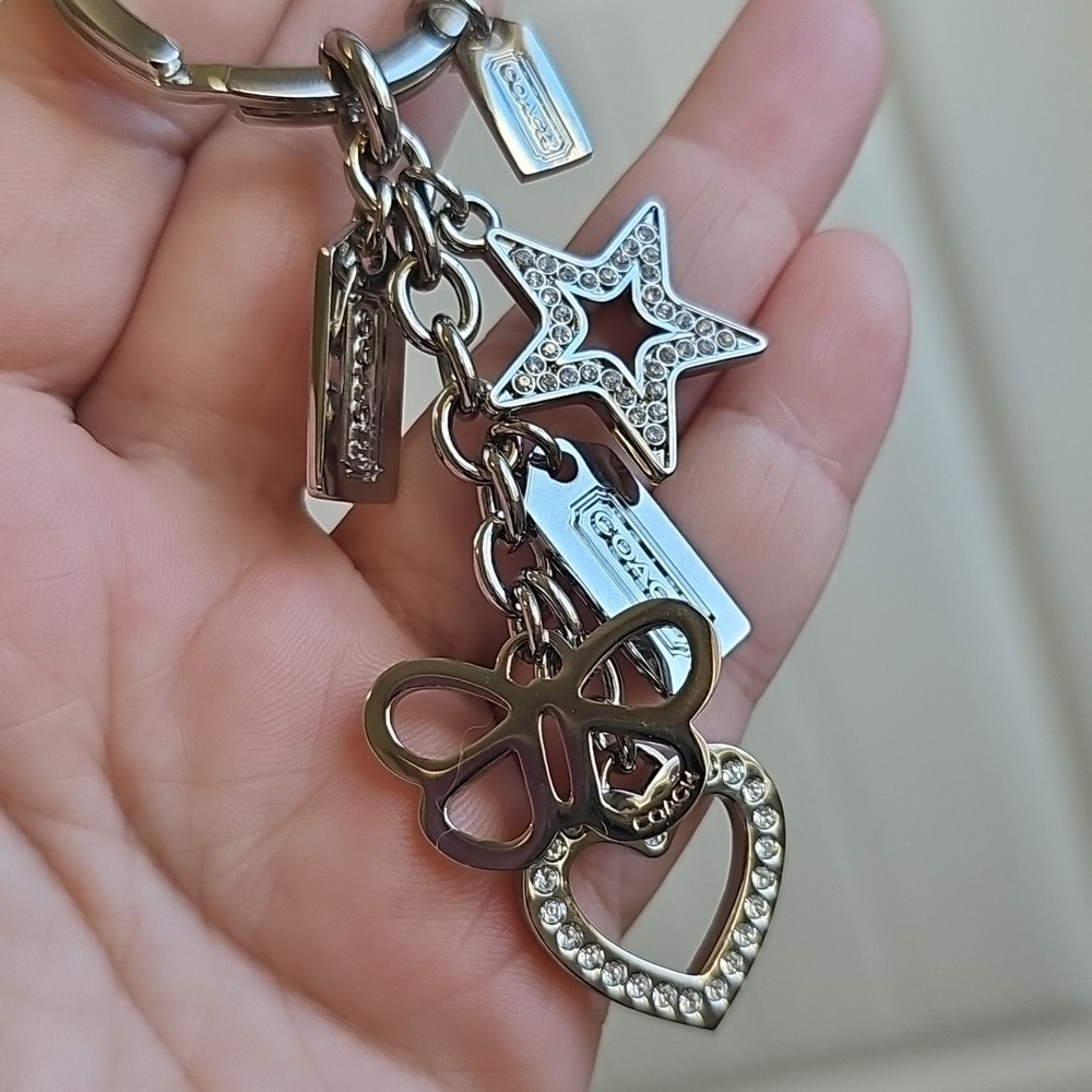 Coach NWOT Silver Keychain with Heart, Star, and Butterfly Charms - Picture 7 of 7